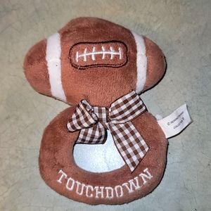 Soft brown football rattle